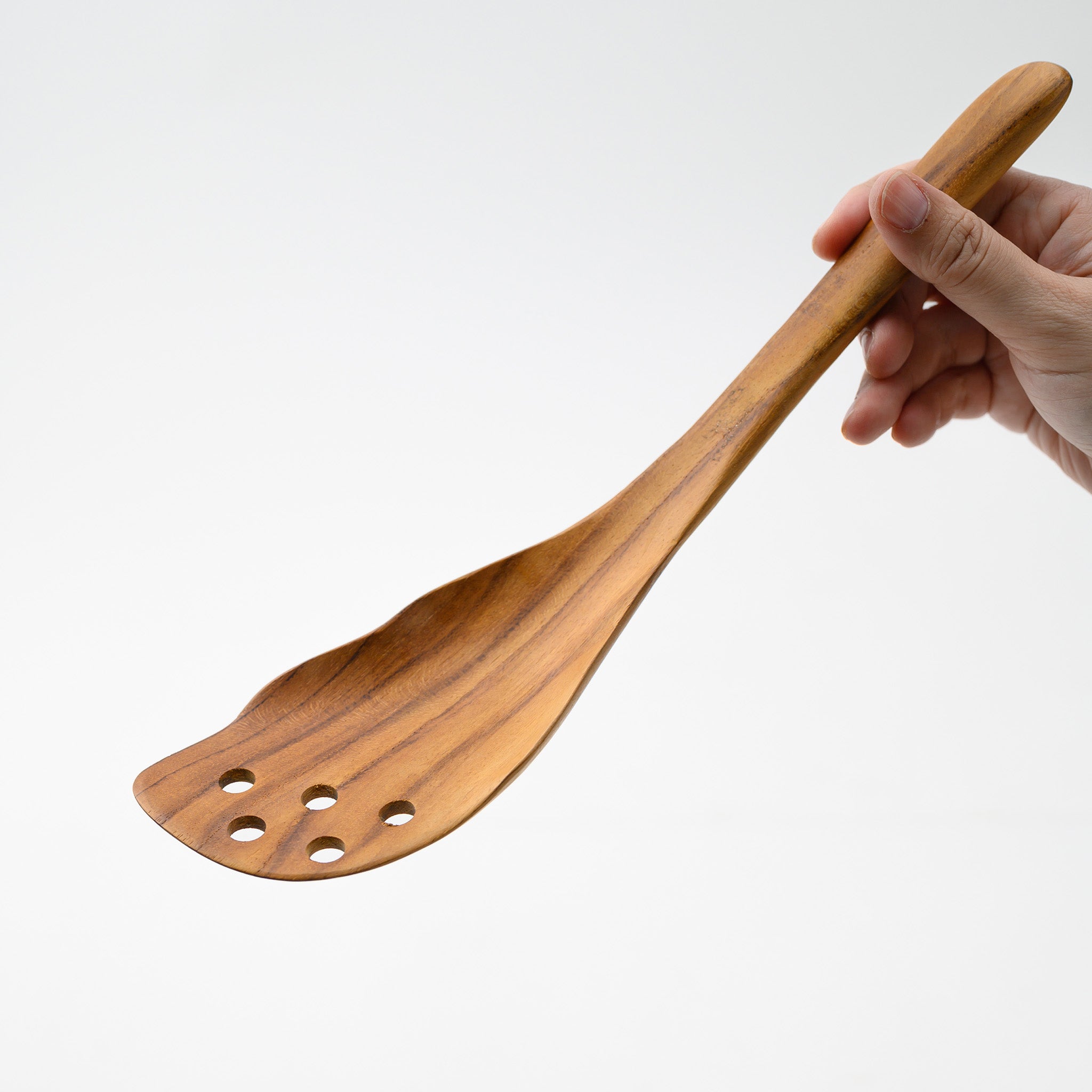 ROMAINE TURNER WITH HOLES